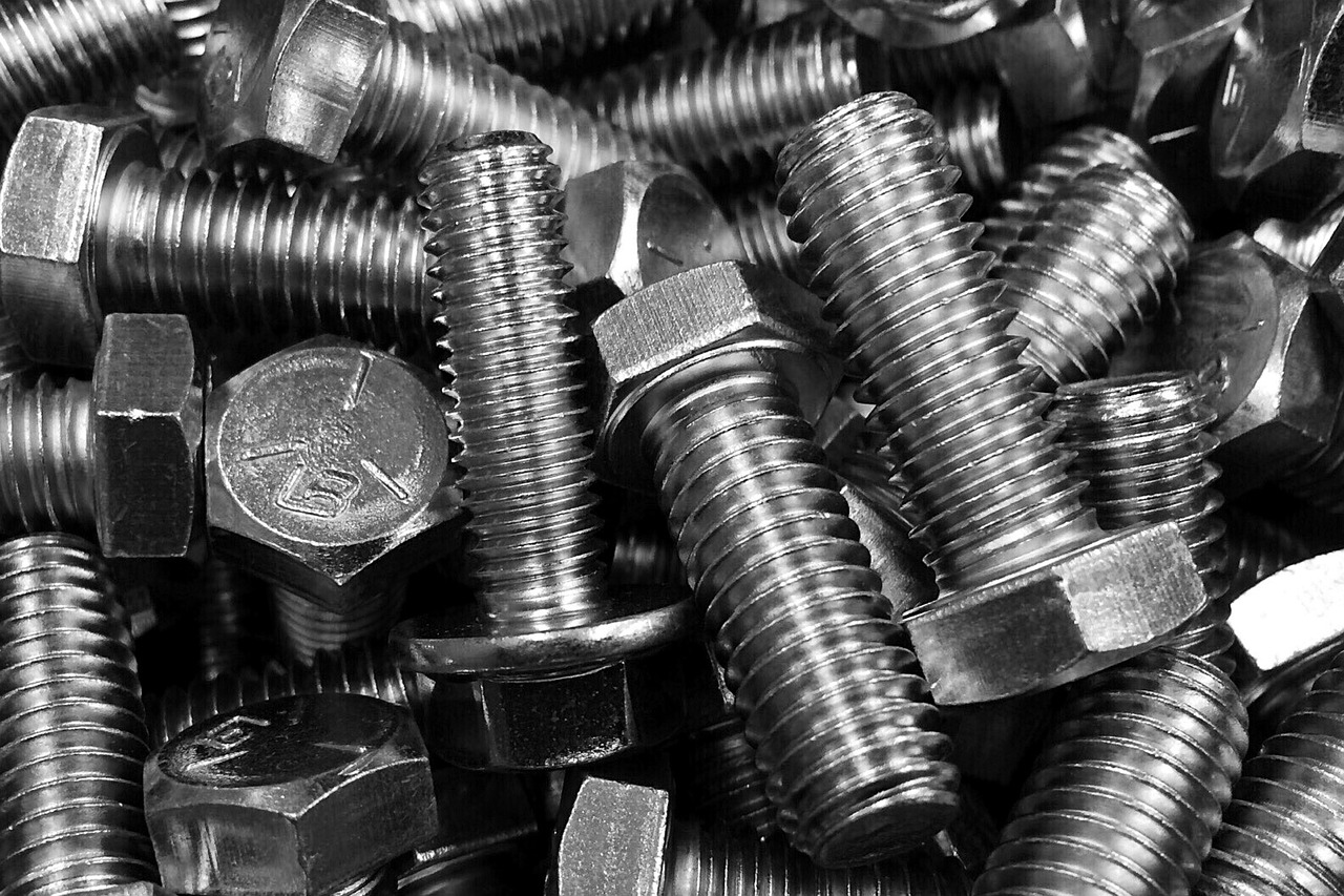 Several fastener bolts in a pile.