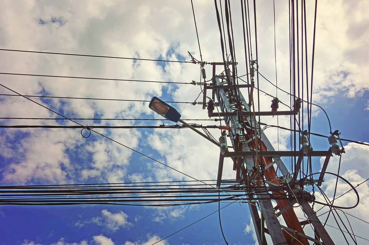 A utility pole on a sunny day.